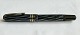 Blue and black 
striped 
Rakete-Tank 
fountain pen. 
Piston filler 
filling system 
that works. 
Ready ...