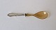 Rita serving 
spoon in silver 
and horn. 
Stamped the 
three towers 
1930. 
Length 18 cm.