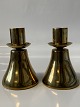 This beautiful 
pair of 
candlesticks is 
quite special, 
as they are 
made from the 
old KTAS bells 
...
