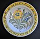 Kelinghusen 
deep faience 
plate, 19th 
century. 
Polychrome 
decorated with 
flower bouquet. 
Dia.: 23 ...
