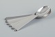Georg Jensen 
Pyramid.
A set of six 
dinner spoons 
in 830 silver 
and sterling 
silver. Three 
of ...