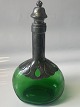 Green carafe 
with tin.
Danish design.
Height.: 25 
cm.
