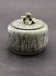 Arne Bang jar 
with lid 
greenish glaze 
height without 
lid 8.5 cm. 
design 29 item 
no. 607523