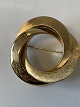 14 Karat gold 
brooch
Diameter 3.6 
cm.