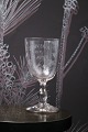 Old French 
souvenir wine 
glass with 
engraved 
writing and 
decorations. 
"Souvenir de la 
feté" ...