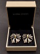 Georg Jensen 
sterling silver 
with 18 karat 
gold earrings 
#400 design 
Lene Munthe 
delivered in 
...