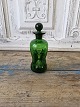 Holmegaard 
small green 
bottle 
Height 14 cm.