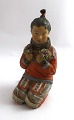 Royal 
Copenhagen. 
Figurine of 
Greenlandic 
girl. Model ...