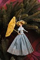 Old Christmas 
tree ornament, 
nice lady with 
umbrella ...