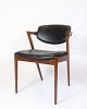 Model 42 is a 
dining chair 
designed by Kai 
Kristiansen and 
manufactured by 
Schou Andersen 
in the ...
