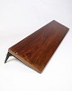 Shelf in 
rosewood with 
black lacquered 
metal 
suspension, 
designed by 
Albert Hansen 
as part of ...