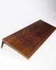 Wall-mounted 
shelf in 
rosewood with 
black lacquered 
metal 
suspension, 
designed by 
Albert Hansen 
...