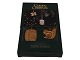 Georg Jensen 
Golden 
Christmas 
Ornament - 
Walnut and 
Squirrel.
Perfect 
condition.