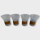 Kastrup 
Glassworks, 4 
glasses with 
bamboo 
wrapping, 
height 8.7cm, 
diameter 6.8cm, 
on two glasses 
...