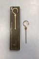 Royal 
Copenhagen 
Confectionery 
Skewer. Gilded 
brass and 
steel. Design: 
Henrik Holbæk / 
Claus ...