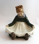 Royal 
Copenhagen. 
Porcelain 
figure. Fanø 
girl. Model 
1315. Height 13 
cm. (4 quality)