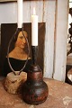 Antique Swedish 
candlestick 
from the year 
1801, with a 
wooden base and 
wrought iron 
candle ...