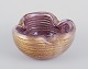 Murano, Italy.
Art glass 
bowl.
Purple and 
clear glass 
with gold leaf 
...