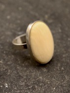 N E From sterling silver ring with bone