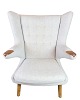 the Papa Bear 
Chair model 
AP19, designed 
by Hans J. 
Wegner in 1951. 
The chair is 
upholstered in 
...