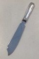 Georg Jensen 
Sterling Silver 
Double Fluted 
Cake Knife No 
196. 
Measures: 25.6 
cm / 10.08 inch