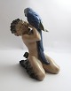 Royal 
Copenhagen. 
Porcelain 
figure. Faun 
with parrot. 
...