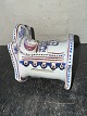 Faiance digure: 
Cradle With 
Child as Money 
box From ...