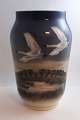 Royal 
Copenhagen. 
Porcelain vase 
with swans. 
Model 
1955/1217. 
Height 25 cm. 
(2 quality)