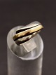 Sterling silver 
ring with gold 
stripe