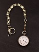 Silver pocket 
watch with key 
winding