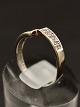 14 carat white 
gold ring with 
small diamonds