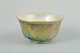 Daisy 
Makeig-Jones 
for Wedgwood, 
England
Bowl in 
“Lustre Ware” 
with green 
glaze, 
decorated with 
...