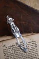 Old bookmark in 
silver (stamped 
Chr. J. 830S) 
Length 8.7cm. 
with motif of a 
sailor playing 
the ...
