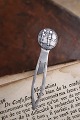 Old bookmark in 
silver 
(stamped) 
Length 6cm. 
with motif of 
little boy & 
girl.