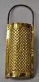 Antique Danish 
brass grater, 
19th century. 
L: 30.5 cm. 
Unmarked.