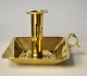 Chamber 
candlestick in 
brass, 19th 
century. With 
handle and drip 
tray. H: 10 cm. 
L: 15.5 cm. W: 
...