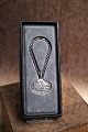 Georg Jensen 
anniversary 
pendant with 
chain in 
sterling 
silver. 
"Georg Jensen 
silversmith ...