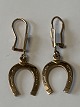 8 carat gold 
earrings with 
horseshoe.
Stamped BH. 
BH.
Length 3.4 cm.
Neat and well 
...