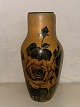 Handpainted 
With flowers: 
Ceramic vase 
From P. Ipsens 
Enke