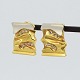 Brian Thomsen; 
A pair of ear 
clips in 18k 
gold
