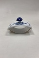 Royal 
Copenhagen Blue 
Fluted Fluted 
Ink Blotter 
Cradle No. 
2034. 1st 
Quality. 
Measures 7.5 cm 
x ...