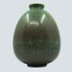 Saxbo stoneware.Eva Stæhr-Nielsen for Saxbo; A vase decorated with a blue and brown glaze ...
