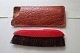 An old clothes 
brush with a 
Etui made of 
leather
From ...