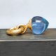 Ole Lynggaard; 
Sweet drops 
charm in 18k 
gold with topaz