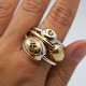 Anette Kræn; 
Set of three 
finger rings of 
silver adorned 
with gold. One 
adorned with 
gold and ...