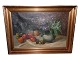 Ingeborg Debois (1897-1970), oil painting with fruits and flowers.The frame measures 75 by ...