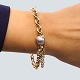 Ole Lynggaard; 
Bracelet of 14k 
gold, with 
clasp in 18k 
...
