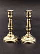 A pair of brass 
candlesticks on 
a round base H. 
18 cm. 19th 
century item 
no. 624861