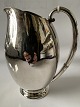 Silver jug 
&#8203;&#8203;Evald 
Nielsen 
hammered
Height. ...