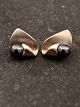 Sterling silver 
ear studs